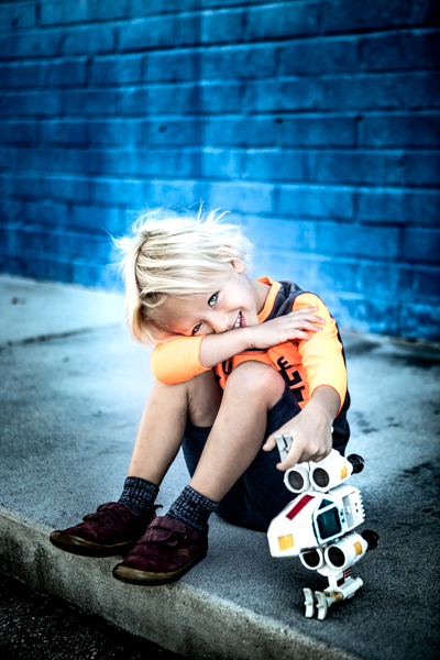 boy with star wars toy